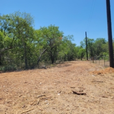 Northeast corner of lot 1 from wheat street. Electric service and back fence is seen.